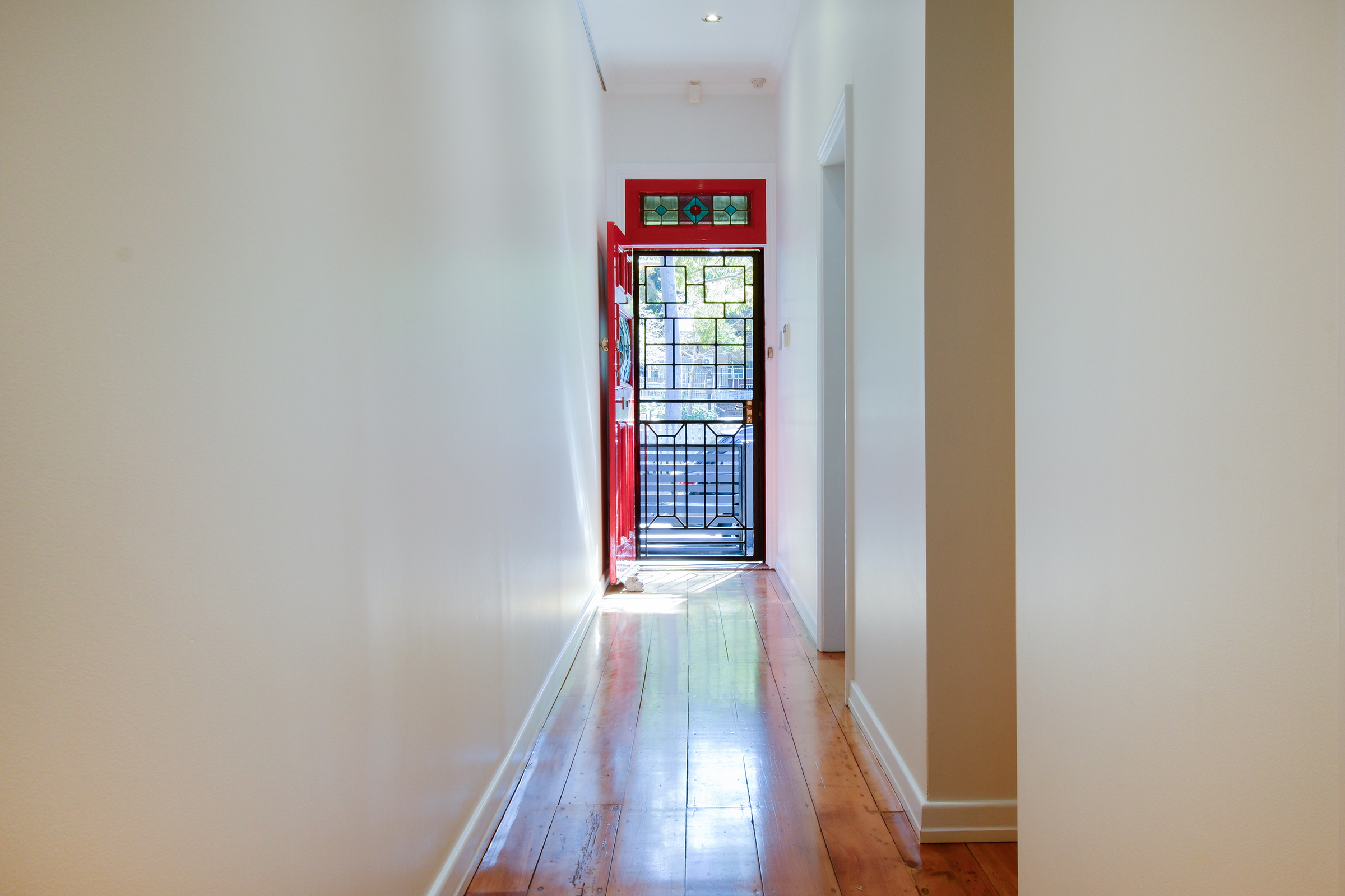 Terrace house with polished wooden floors.