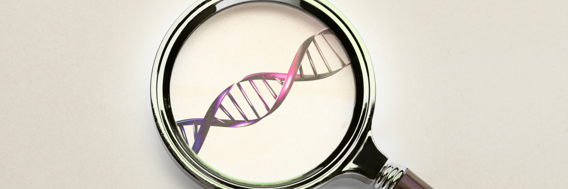 Graphic showing DNA through a magnifying glass